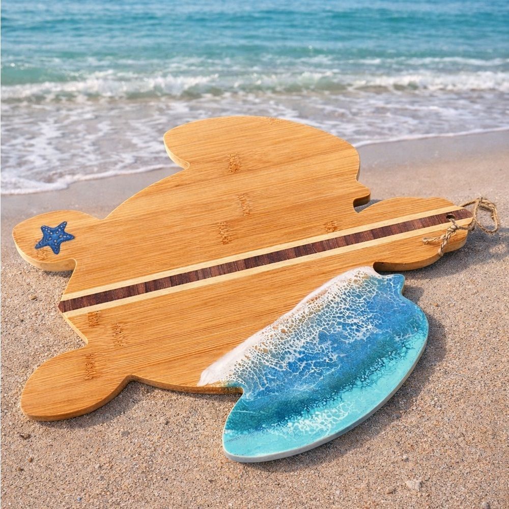 Ocean-Themed Turtle-Shaped Cutting Board with starfish engraving.